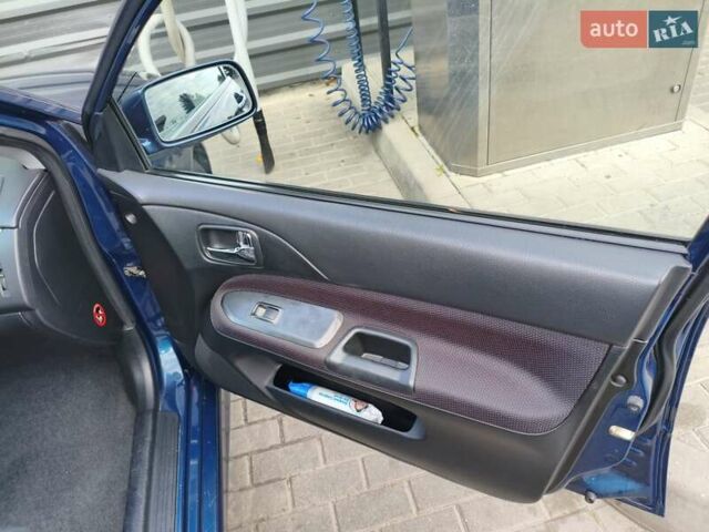 Синій Міцубісі Lancer, об'ємом двигуна 1.6 л та пробігом 258 тис. км за 4300 $, фото 8 на Automoto.ua