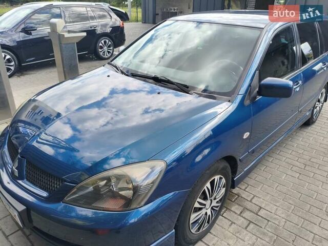 Синій Міцубісі Lancer, об'ємом двигуна 1.6 л та пробігом 258 тис. км за 3000 $, фото 1 на Automoto.ua