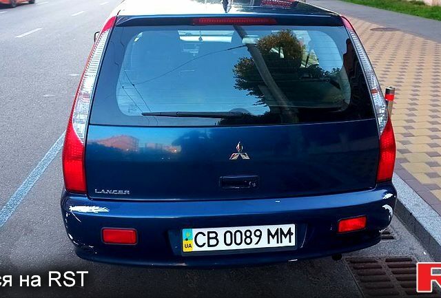 Синій Міцубісі Lancer, об'ємом двигуна 1.6 л та пробігом 245 тис. км за 3299 $, фото 8 на Automoto.ua