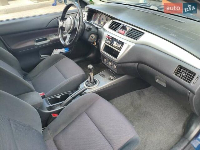 Мицубиси Лансер 2006 в Ковель на Automoto.ua Синий Мицубиси Лансер, объемом двигателя 1.6 л и пробегом 258 тыс. км за 3900 $, фото 9 на Automoto.ua