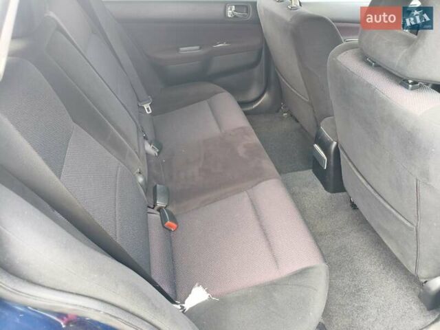 Синій Міцубісі Lancer, об'ємом двигуна 1.6 л та пробігом 258 тис. км за 3000 $, фото 10 на Automoto.ua