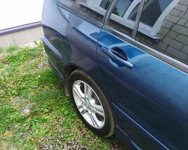 Синій Міцубісі Lancer, об'ємом двигуна 2 л та пробігом 201 тис. км за 4800 $, фото 18 на Automoto.ua