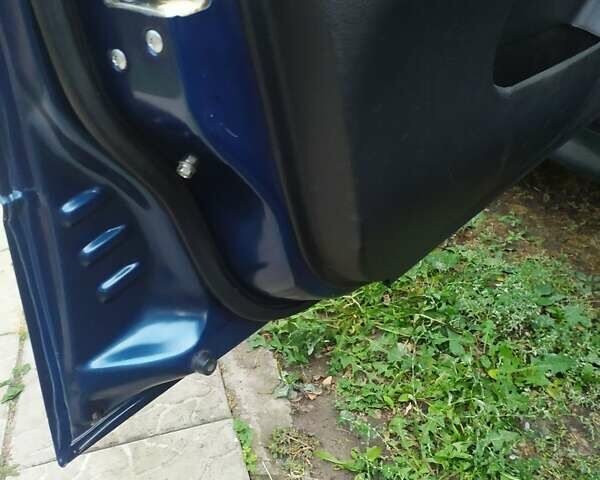 Синій Міцубісі Lancer, об'ємом двигуна 2 л та пробігом 201 тис. км за 4800 $, фото 8 на Automoto.ua