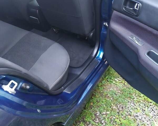 Синій Міцубісі Lancer, об'ємом двигуна 2 л та пробігом 201 тис. км за 4800 $, фото 15 на Automoto.ua