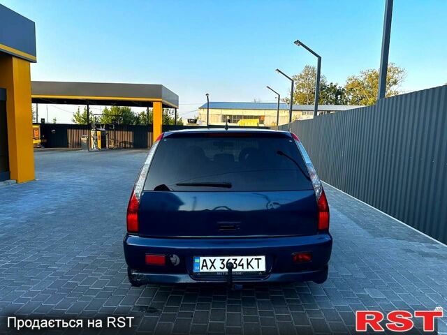 Синий Мицубиси Лансер, объемом двигателя 2 л и пробегом 330 тыс. км за 3400 $, фото 5 на Automoto.ua