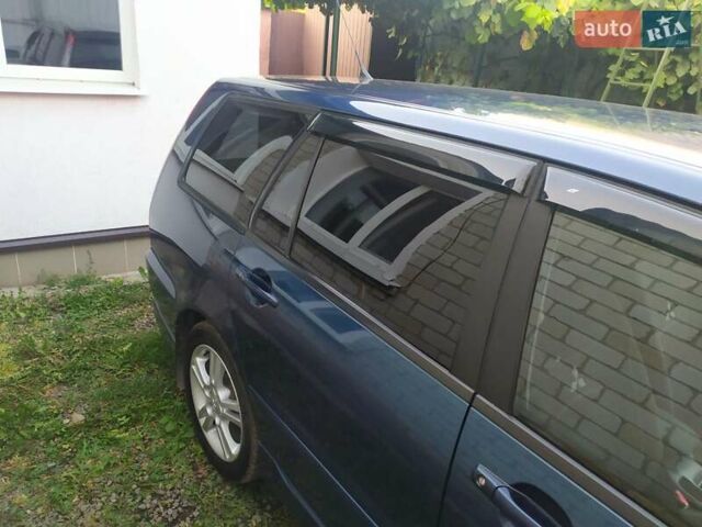 Синій Міцубісі Lancer, об'ємом двигуна 2 л та пробігом 201 тис. км за 4800 $, фото 1 на Automoto.ua