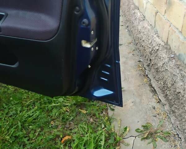 Синій Міцубісі Lancer, об'ємом двигуна 2 л та пробігом 201 тис. км за 4800 $, фото 17 на Automoto.ua