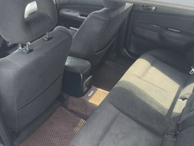 Синій Міцубісі Lancer, об'ємом двигуна 2 л та пробігом 330 тис. км за 4200 $, фото 4 на Automoto.ua