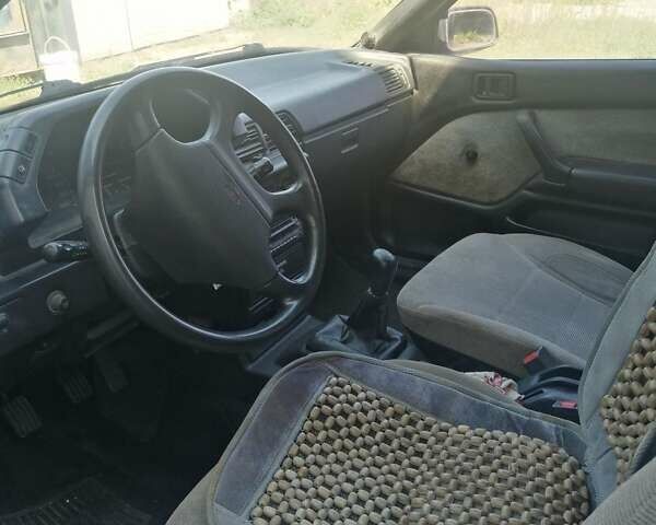 Синий Мицубиси Лансер, объемом двигателя 1.5 л и пробегом 227 тыс. км за 2200 $, фото 5 на Automoto.ua