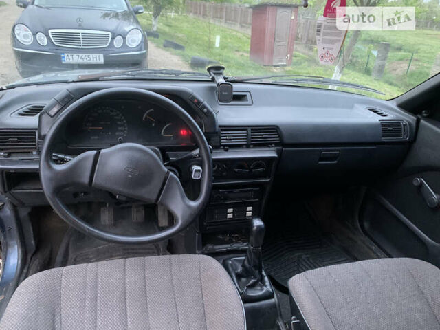 Синій Міцубісі Lancer, об'ємом двигуна 1.5 л та пробігом 352 тис. км за 1100 $, фото 8 на Automoto.ua