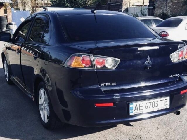 Синий Мицубиси Лансер, объемом двигателя 2.4 л и пробегом 185 тыс. км за 7300 $, фото 1 на Automoto.ua