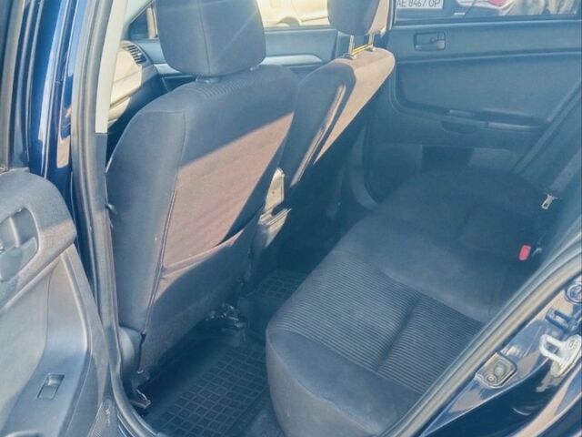 Синий Мицубиси Лансер, объемом двигателя 2.4 л и пробегом 185 тыс. км за 7300 $, фото 3 на Automoto.ua