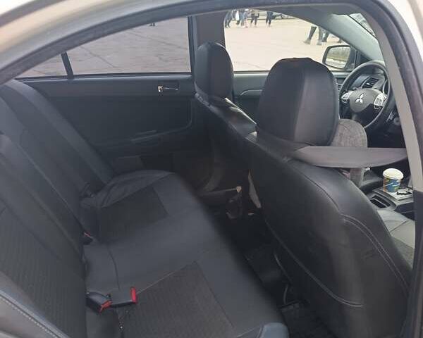 Зелений Міцубісі Lancer, об'ємом двигуна 2 л та пробігом 258 тис. км за 6500 $, фото 1 на Automoto.ua