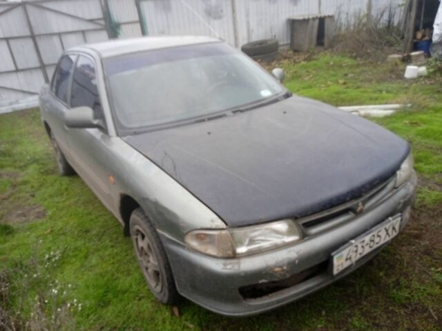 Зеленый Мицубиси Лансер, объемом двигателя 0 л и пробегом 111 тыс. км за 700 $, фото 1 на Automoto.ua