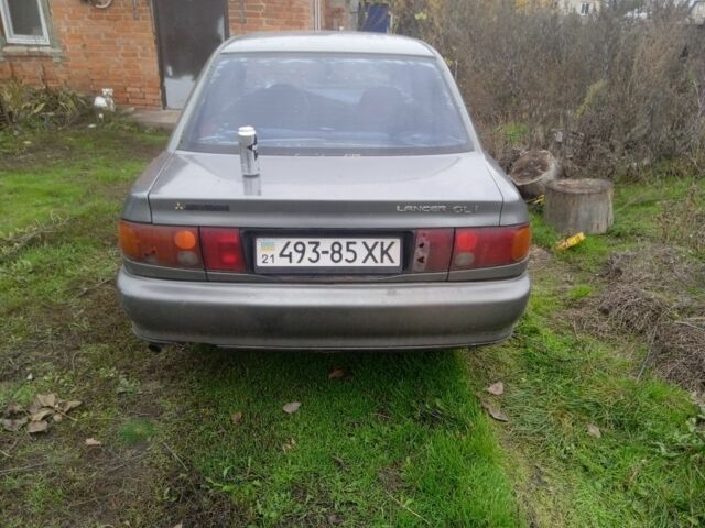 Зеленый Мицубиси Лансер, объемом двигателя 0 л и пробегом 111 тыс. км за 700 $, фото 2 на Automoto.ua