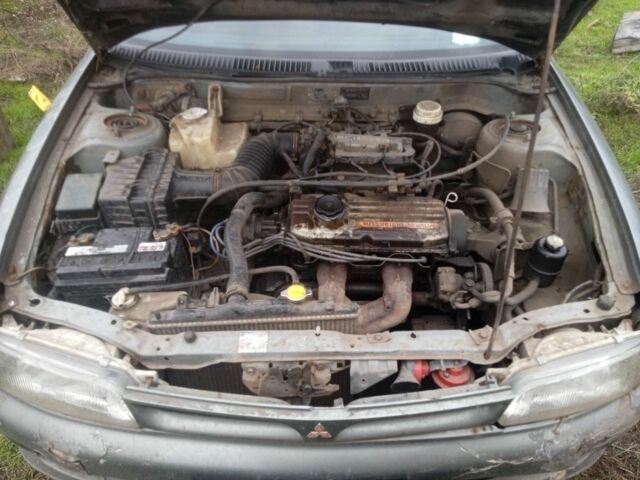 Зеленый Мицубиси Лансер, объемом двигателя 0 л и пробегом 111 тыс. км за 700 $, фото 4 на Automoto.ua