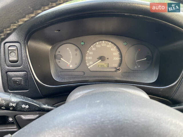 Зелений Міцубісі Lancer, об'ємом двигуна 1.3 л та пробігом 378 тис. км за 1750 $, фото 12 на Automoto.ua