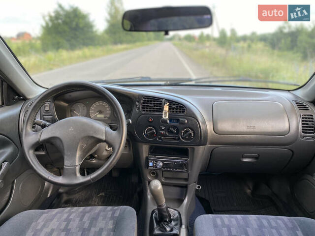 Зелений Міцубісі Lancer, об'ємом двигуна 1.3 л та пробігом 378 тис. км за 1750 $, фото 11 на Automoto.ua