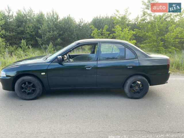Зелений Міцубісі Lancer, об'ємом двигуна 1.3 л та пробігом 378 тис. км за 1750 $, фото 2 на Automoto.ua