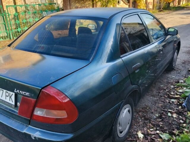 Мицубиси Лансер 1996 в Фастове на Automoto.ua Зеленый Мицубиси Лансер, объемом двигателя 1.3 л и пробегом 500 тыс. км за 1800 $, фото 3 на Automoto.ua