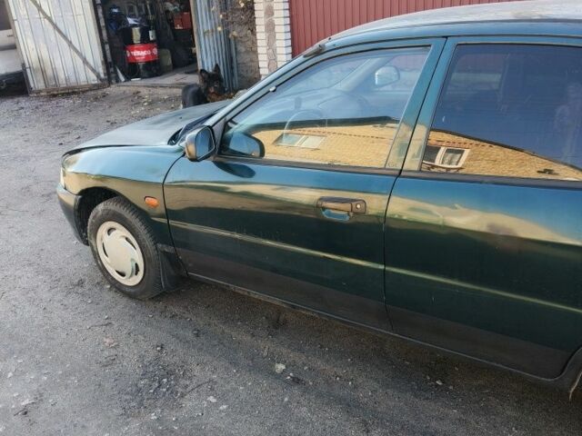 Мицубиси Лансер 1996 в Фастове на Automoto.ua Зеленый Мицубиси Лансер, объемом двигателя 1.3 л и пробегом 500 тыс. км за 1800 $, фото 5 на Automoto.ua