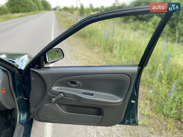Зелений Міцубісі Lancer, об'ємом двигуна 1.3 л та пробігом 378 тис. км за 1750 $, фото 9 на Automoto.ua
