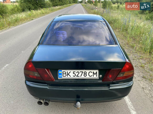Зелений Міцубісі Lancer, об'ємом двигуна 1.3 л та пробігом 378 тис. км за 1750 $, фото 6 на Automoto.ua