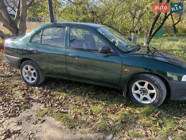 Мицубиси Лансер 2004 в Бережанах на Automoto.ua Зеленый Мицубиси Лансер, объемом двигателя 1.31 л и пробегом 250 тыс. км за 1500 $, фото 2 на Automoto.ua
