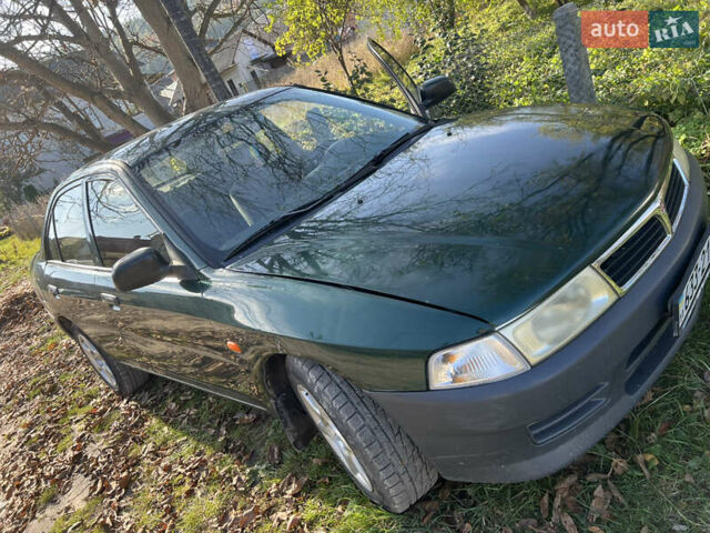 Мицубиси Лансер 2004 в Бережанах на Automoto.ua Зеленый Мицубиси Лансер, объемом двигателя 1.31 л и пробегом 250 тыс. км за 1500 $, фото 3 на Automoto.ua