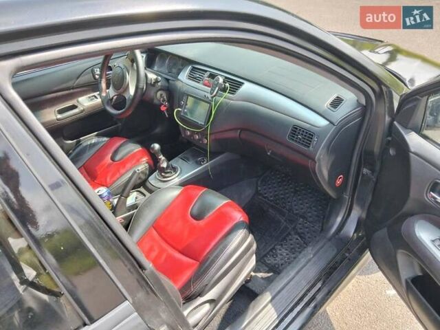 Зеленый Мицубиси Лансер, объемом двигателя 2 л и пробегом 340 тыс. км за 3500 $, фото 9 на Automoto.ua