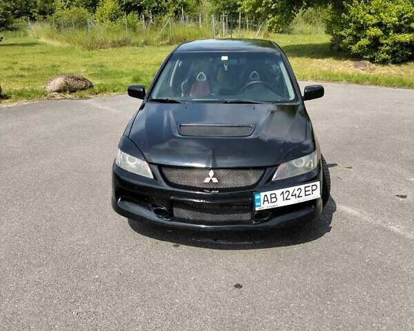 Зеленый Мицубиси Лансер, объемом двигателя 2 л и пробегом 340 тыс. км за 3500 $, фото 5 на Automoto.ua