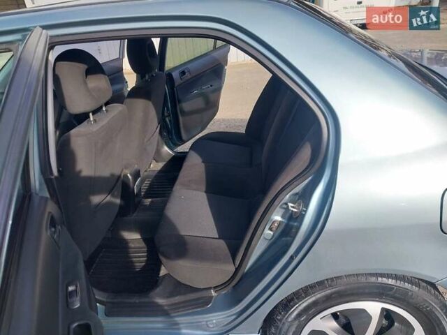 Зелений Міцубісі Lancer, об'ємом двигуна 1.58 л та пробігом 272 тис. км за 3800 $, фото 23 на Automoto.ua