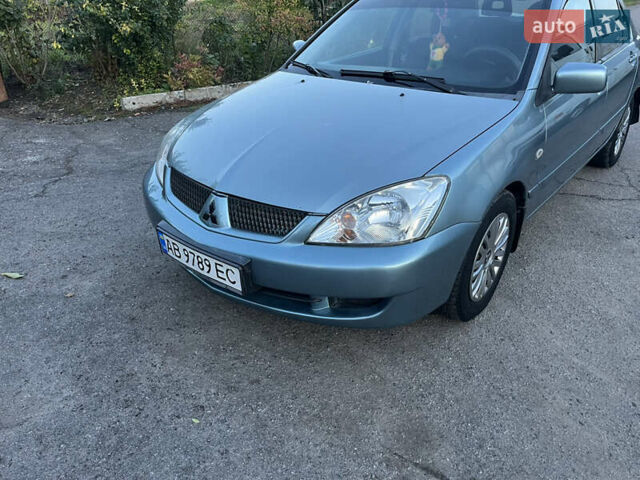 Зелений Міцубісі Lancer, об'ємом двигуна 1.6 л та пробігом 252 тис. км за 3650 $, фото 2 на Automoto.ua