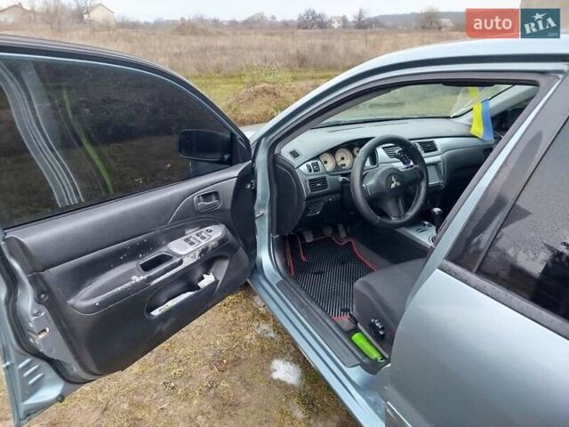 Зеленый Мицубиси Лансер, объемом двигателя 1.58 л и пробегом 224 тыс. км за 3500 $, фото 16 на Automoto.ua