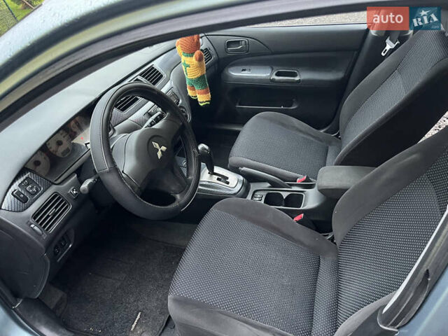 Зелений Міцубісі Lancer, об'ємом двигуна 1.6 л та пробігом 252 тис. км за 3650 $, фото 17 на Automoto.ua