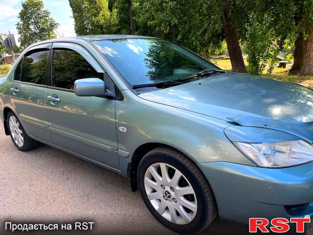 Зелений Міцубісі Lancer, об'ємом двигуна 1.6 л та пробігом 290 тис. км за 4450 $, фото 7 на Automoto.ua