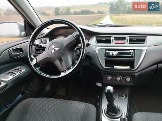 Зеленый Мицубиси Лансер, объемом двигателя 1.6 л и пробегом 135 тыс. км за 6931 $, фото 4 на Automoto.ua