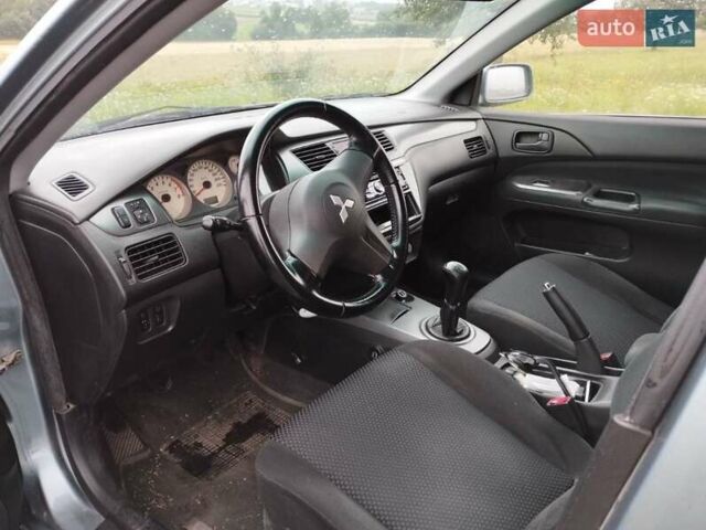 Зеленый Мицубиси Лансер, объемом двигателя 1.6 л и пробегом 135 тыс. км за 6931 $, фото 5 на Automoto.ua