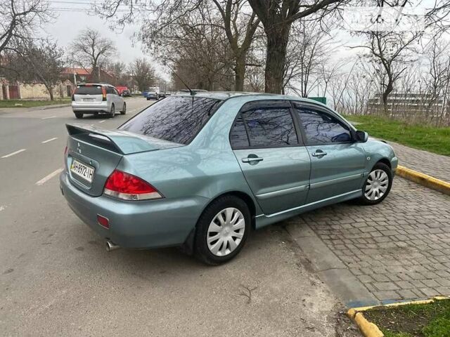 Зелений Міцубісі Lancer, об'ємом двигуна 0 л та пробігом 176 тис. км за 4900 $, фото 4 на Automoto.ua