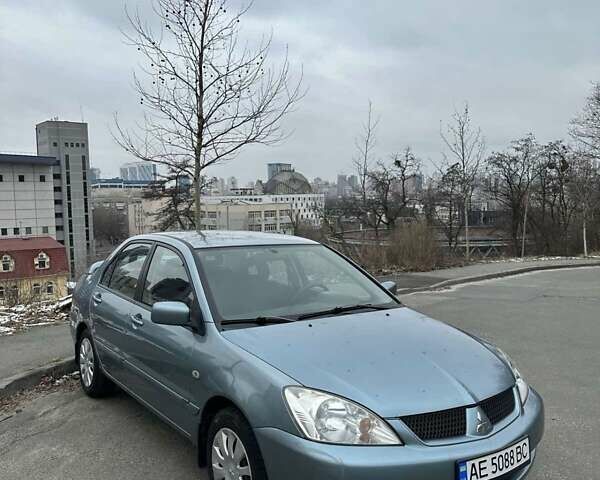 Зеленый Мицубиси Лансер, объемом двигателя 1.58 л и пробегом 207 тыс. км за 4200 $, фото 10 на Automoto.ua