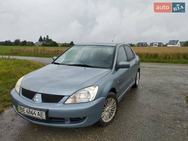 Зеленый Мицубиси Лансер, объемом двигателя 1.6 л и пробегом 135 тыс. км за 6931 $, фото 2 на Automoto.ua