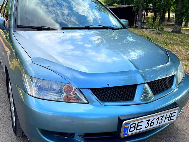 Зелений Міцубісі Lancer, об'ємом двигуна 1.6 л та пробігом 290 тис. км за 4450 $, фото 9 на Automoto.ua