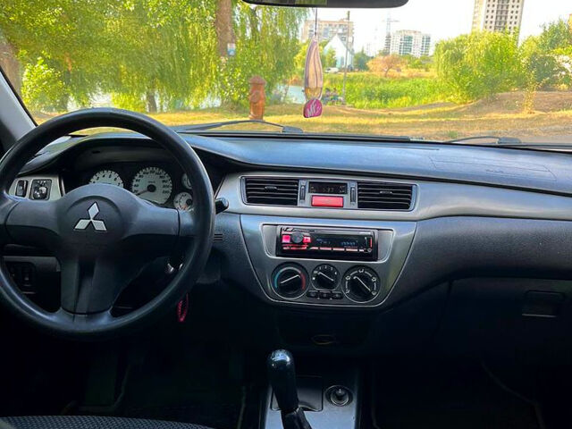 Зелений Міцубісі Lancer, об'ємом двигуна 1.6 л та пробігом 290 тис. км за 4450 $, фото 11 на Automoto.ua