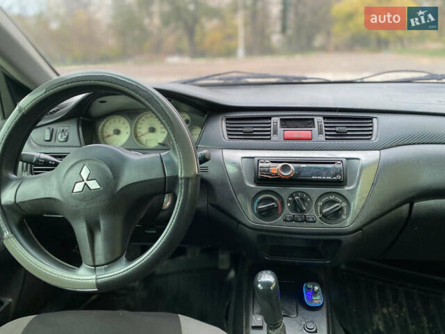 Міцубісі Lancer 2006 у Краматорске на Automoto.ua Зелений Міцубісі Lancer, об'ємом двигуна 1.58 л та пробігом 100 тис. км за 3700 $, фото 6 на Automoto.ua