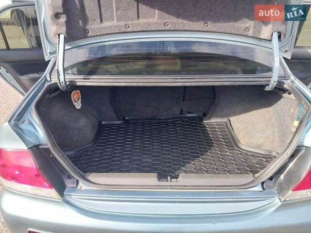 Зелений Міцубісі Lancer, об'ємом двигуна 1.58 л та пробігом 272 тис. км за 3800 $, фото 24 на Automoto.ua