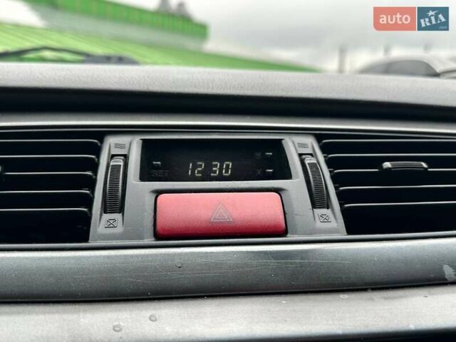Зелений Міцубісі Lancer, об'ємом двигуна 1.58 л та пробігом 208 тис. км за 3990 $, фото 20 на Automoto.ua