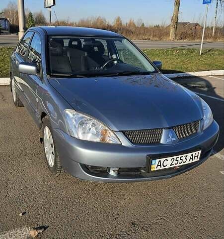 Зелений Міцубісі Lancer, об'ємом двигуна 1.58 л та пробігом 215 тис. км за 5000 $, фото 2 на Automoto.ua