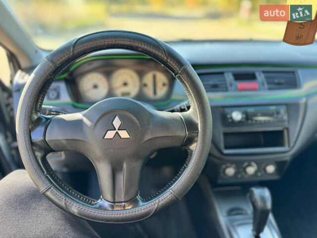 Мицубиси Лансер 2006 в Николаеве на Automoto.ua Зеленый Мицубиси Лансер, объемом двигателя 1.58 л и пробегом 271 тыс. км за 4599 $, фото 17 на Automoto.ua