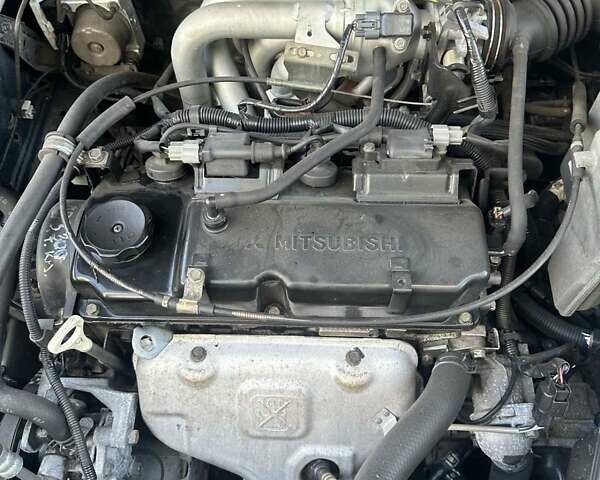 Зеленый Мицубиси Лансер, объемом двигателя 1.58 л и пробегом 207 тыс. км за 4200 $, фото 20 на Automoto.ua