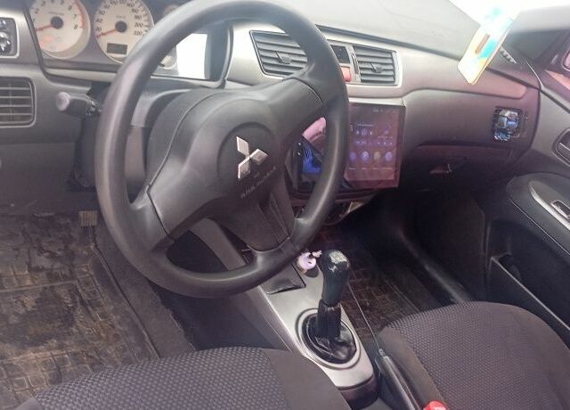 Зелений Міцубісі Lancer, об'ємом двигуна 1.6 л та пробігом 320 тис. км за 4500 $, фото 5 на Automoto.ua